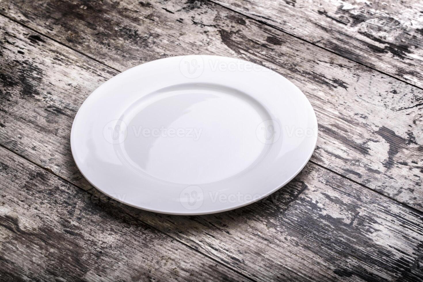 white plate on  table photo