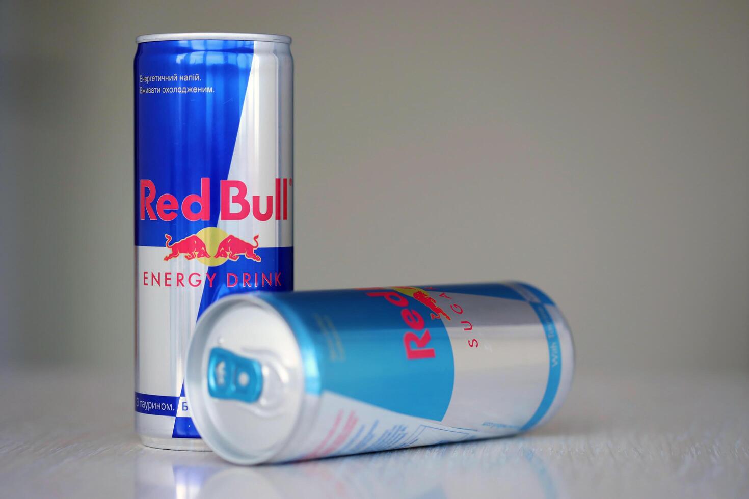 TERNOPIL, UKRAINE - JULY 7, 2023 Red Bull energy drink aluminium tin can with original design photo