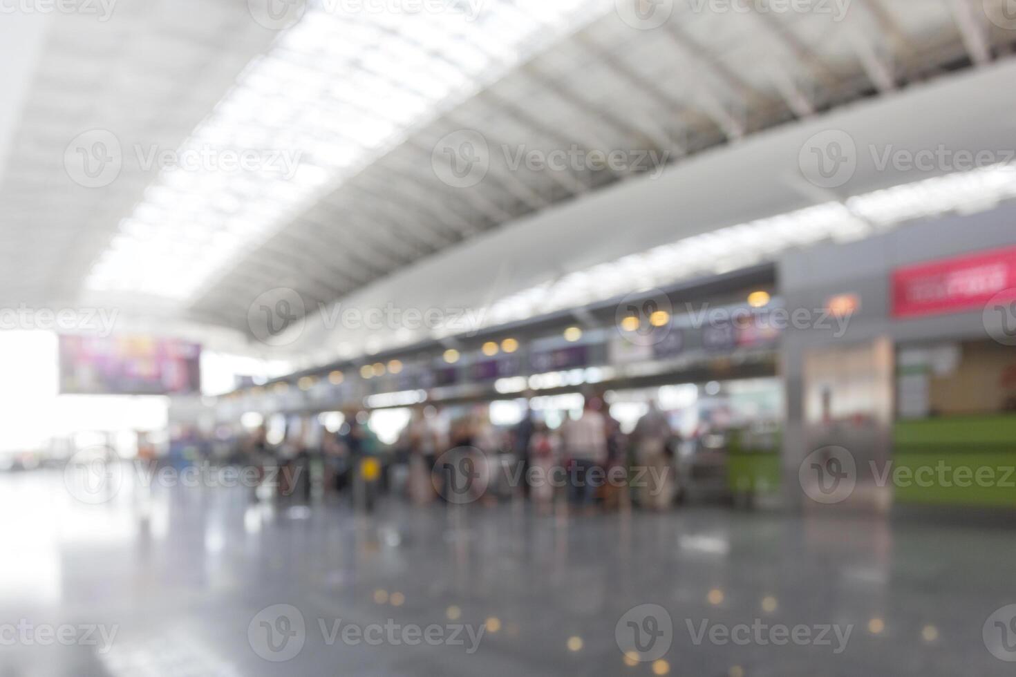 Passengers in an airport photo