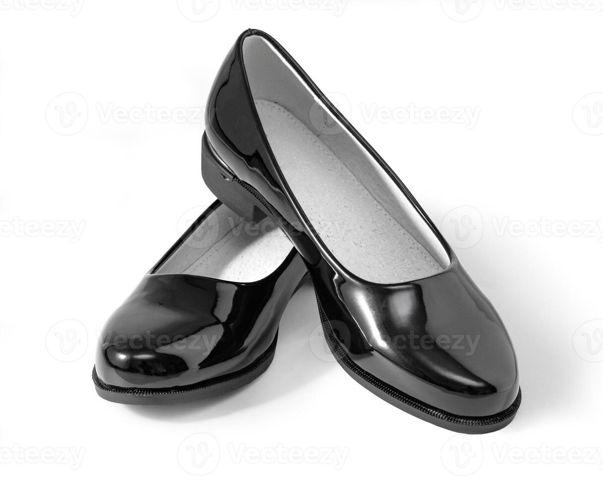 Female lacquered black  shoes photo