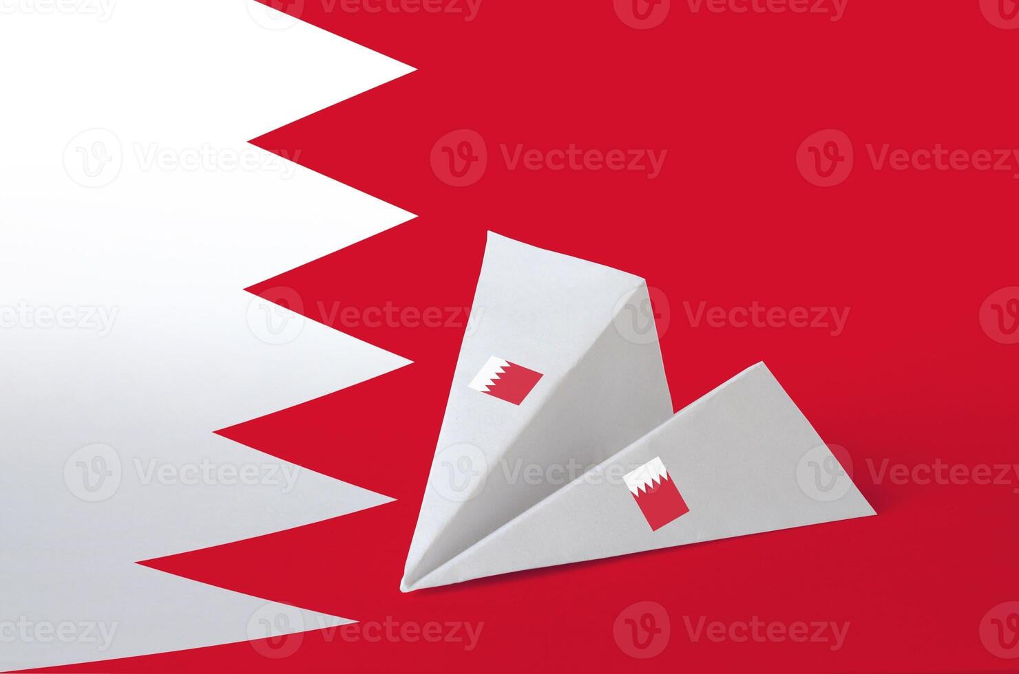 Bahrain flag depicted on paper origami airplane. Handmade arts concept photo