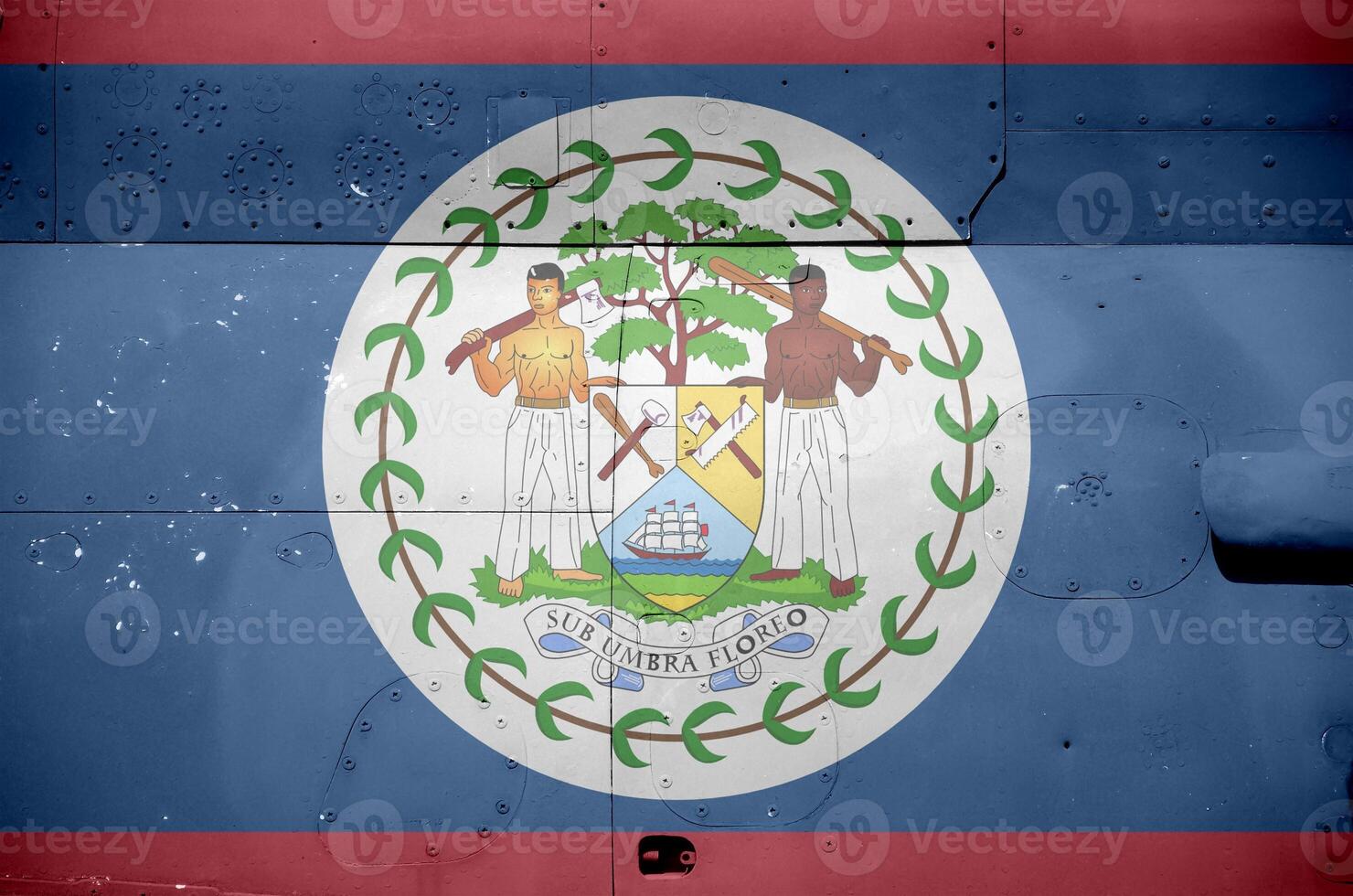 Belize flag depicted on side part of military armored helicopter closeup. Army forces aircraft conceptual background photo