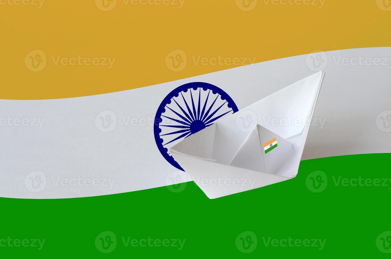 India flag depicted on paper origami ship closeup. Handmade arts concept photo