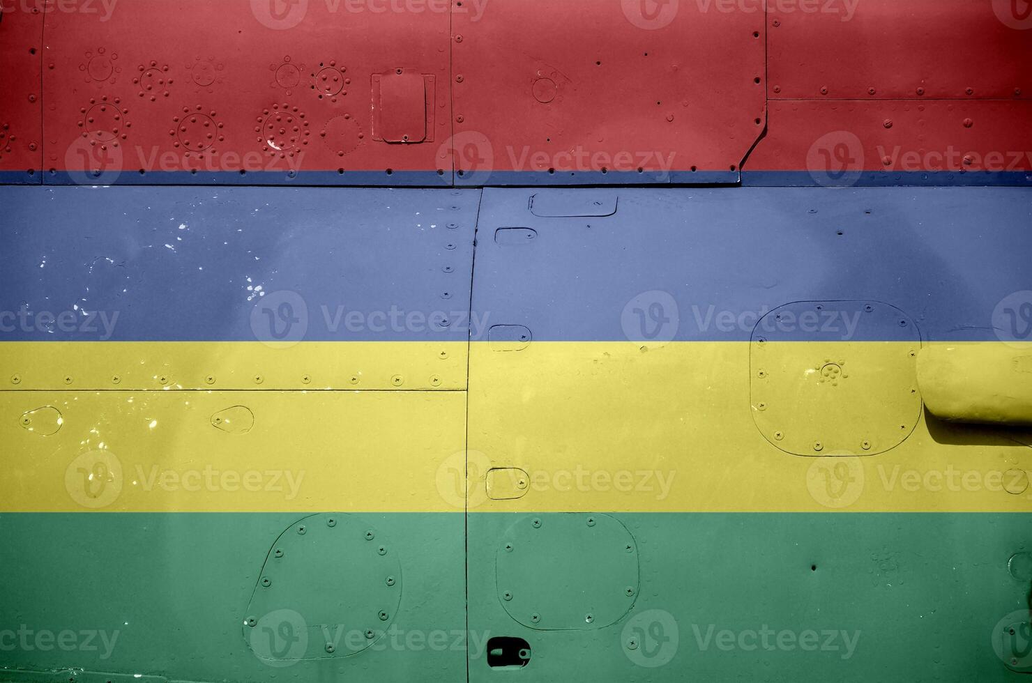 Mauritius flag depicted on side part of military armored helicopter closeup. Army forces aircraft conceptual background photo