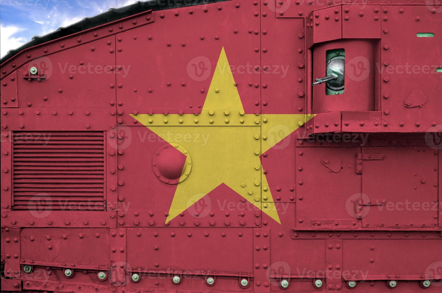 Vietnam flag depicted on side part of military armored tank closeup. Army forces conceptual background photo