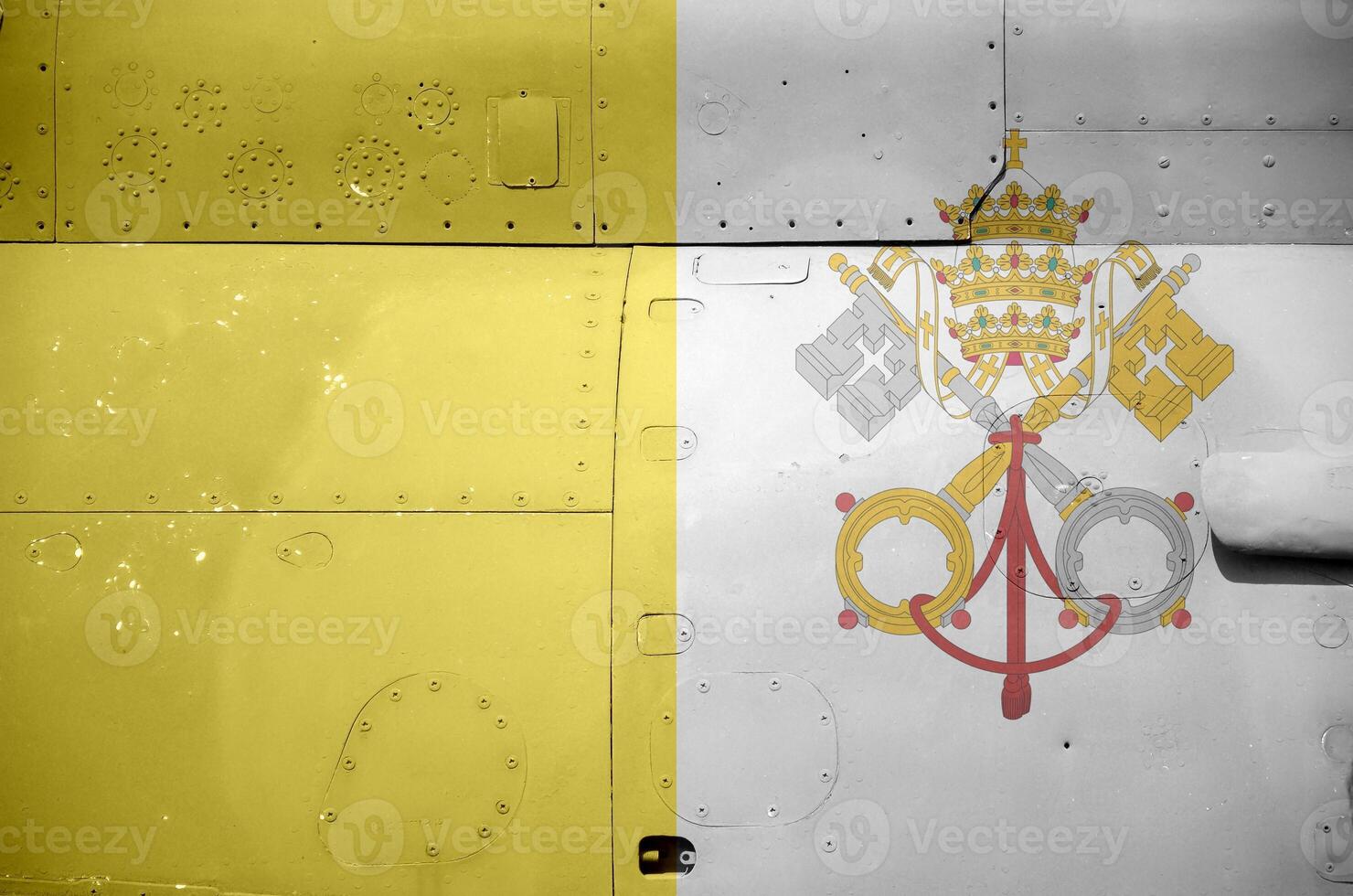Vatican City State flag depicted on side part of military armored helicopter closeup. Army forces aircraft conceptual background photo