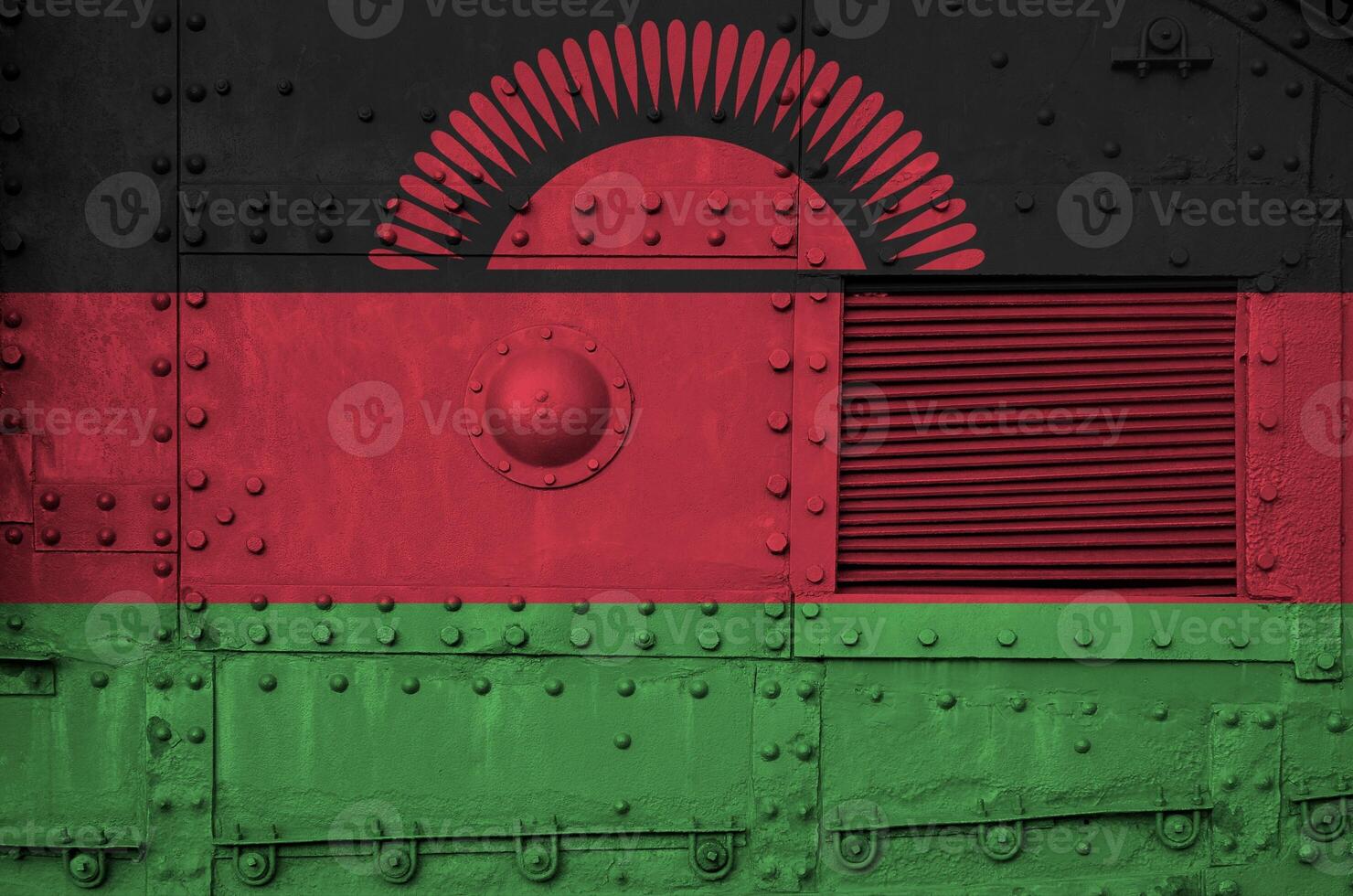 Malawi flag depicted on side part of military armored tank closeup. Army forces conceptual background photo