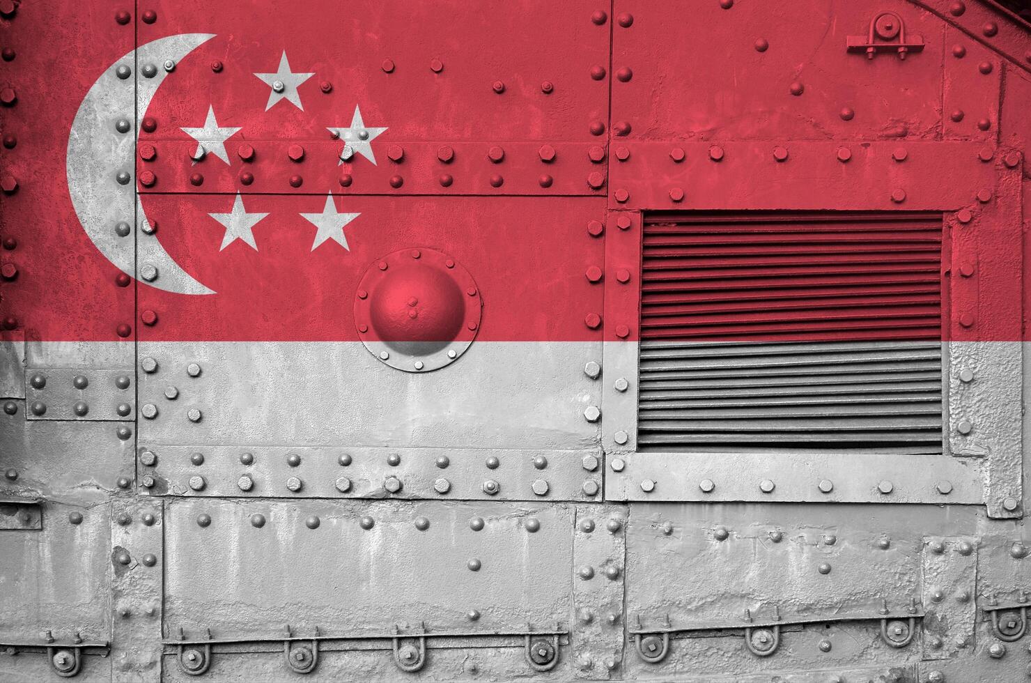 Singapore flag depicted on side part of military armored tank closeup. Army forces conceptual background photo