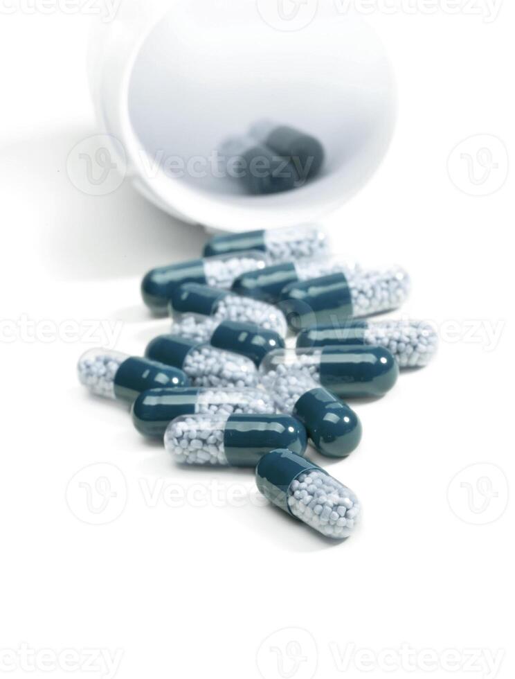 Pills spilling isolated photo