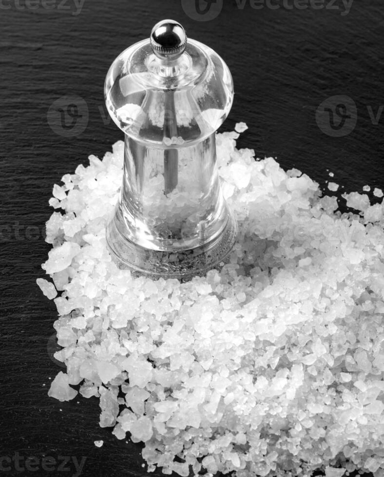 white salt on black photo