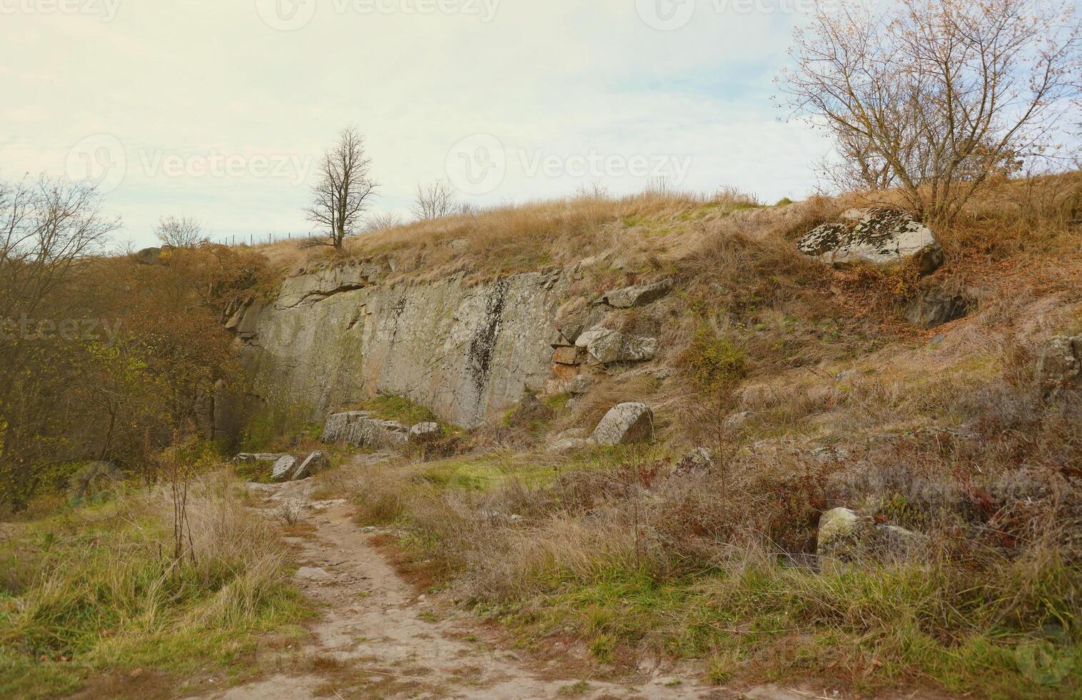 Granite rocks of Bukski Canyon in autumn. Picturesque landscape and beautiful place in Ukraine photo
