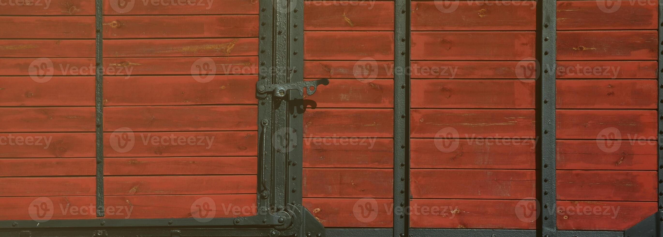 The side of the old brown wooden freight car of the times of the Soviet Union photo