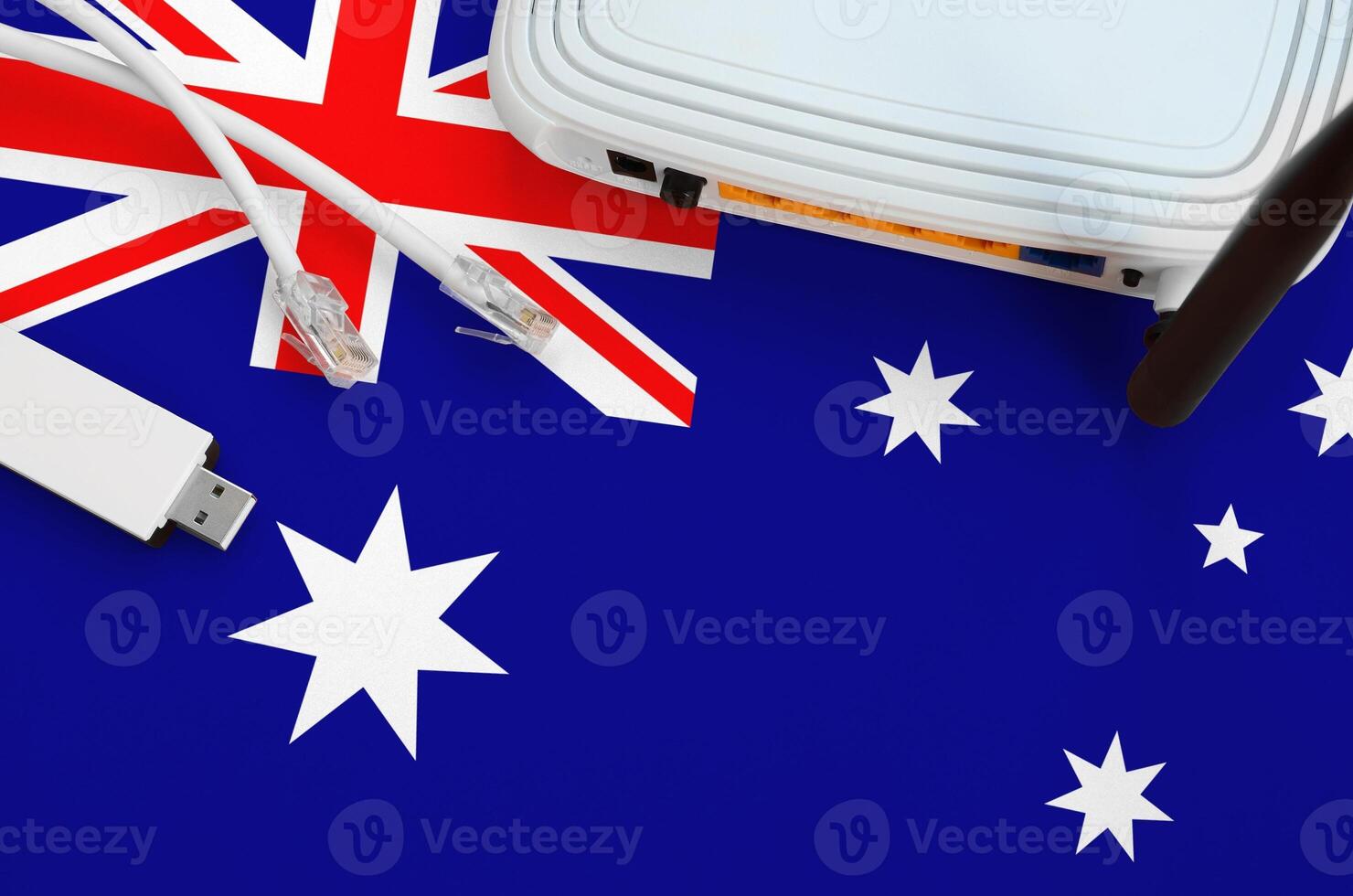 Australia flag depicted on table with internet rj45 cable, wireless usb wifi adapter and router. Internet connection concept photo