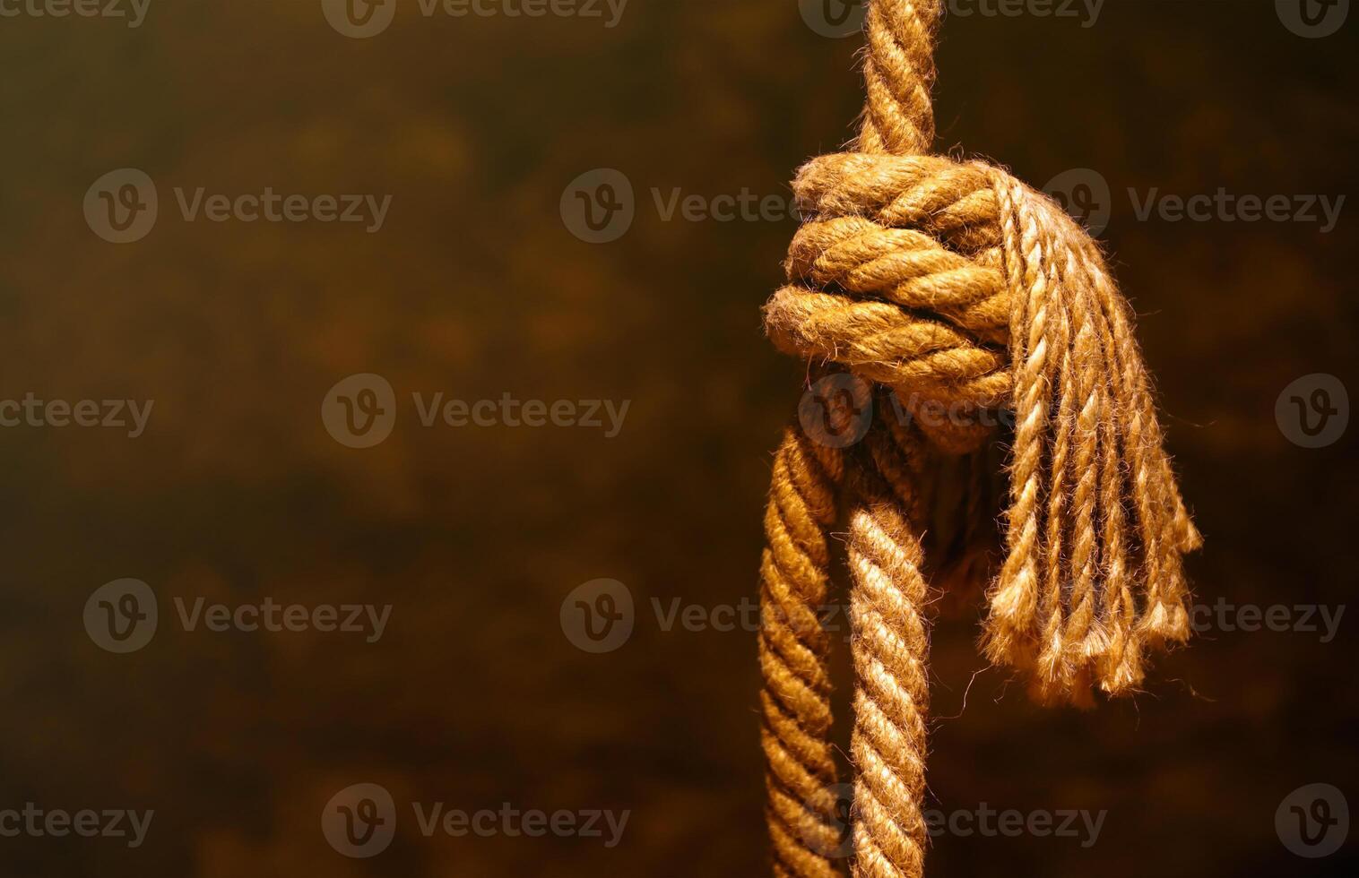 Noose in prison of old castle cellar and grunge stone wall photo