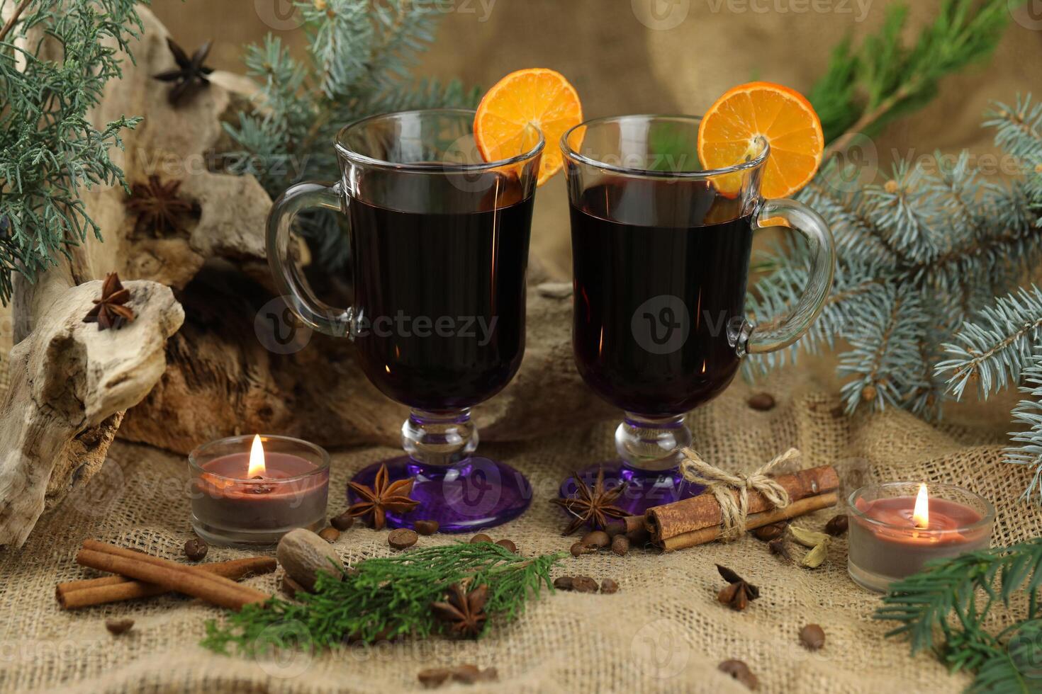 Glasses with mulled wine and spices photo