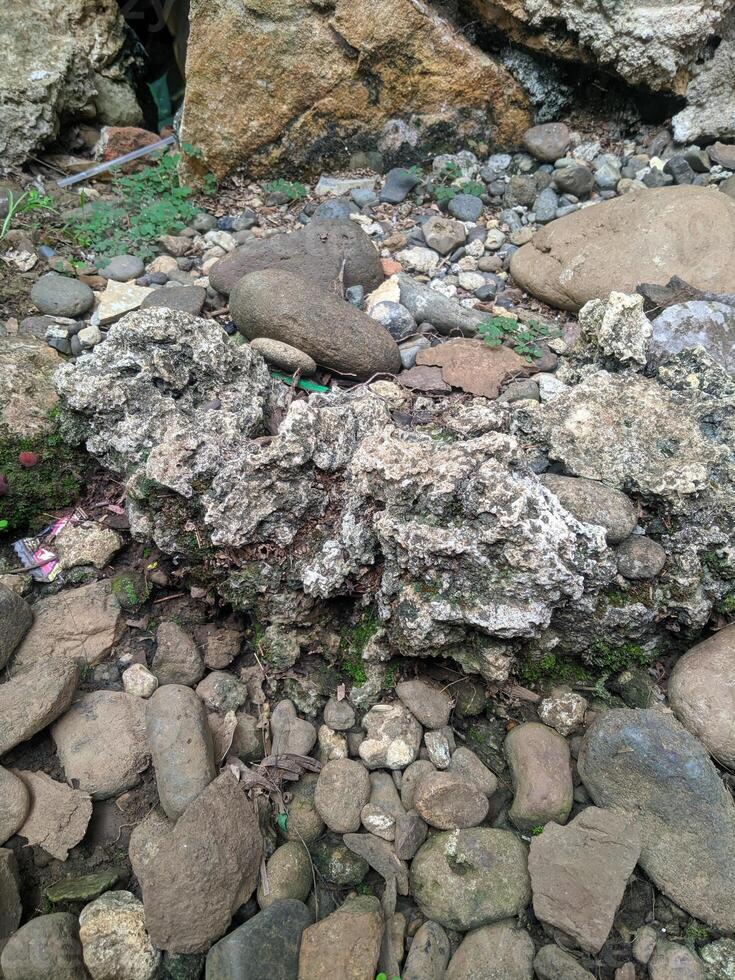 Close up view of the strange patterned background of mountain rocks taken while traveling in Sulawesi, Indonesia photo