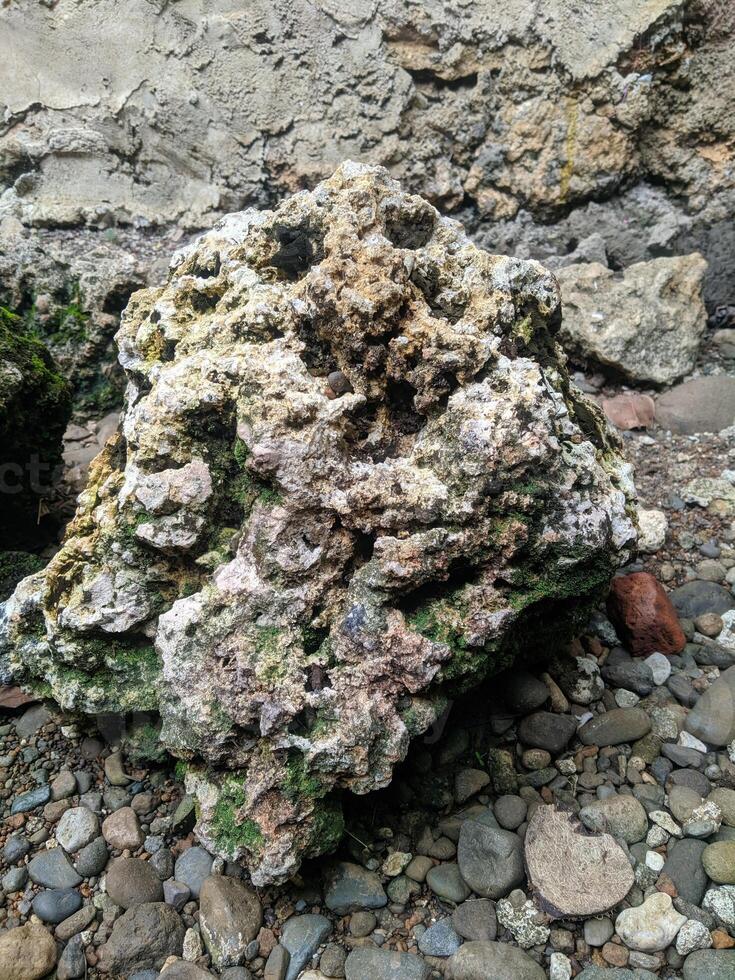Close up view of the strange patterned background of mountain rocks taken while traveling in Sulawesi, Indonesia photo