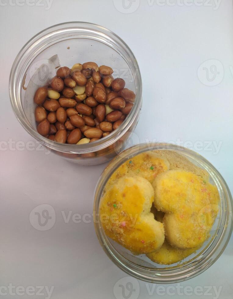 A view of the traditional cake of Ramadan or after the Eid al-Fitr holiday in Indonesia made from nuts as the main ingredient is seen in a bowl on a white background photo