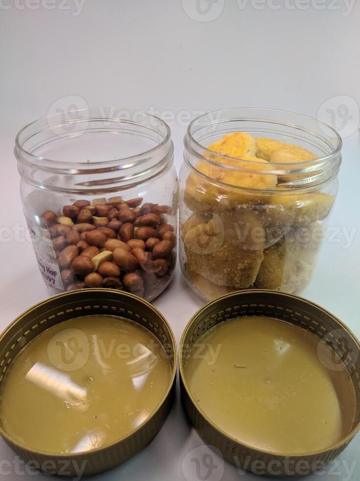 A view of the traditional cake of Ramadan or after the Eid al-Fitr holiday in Indonesia made from nuts as the main ingredient is seen in a bowl on a white background photo