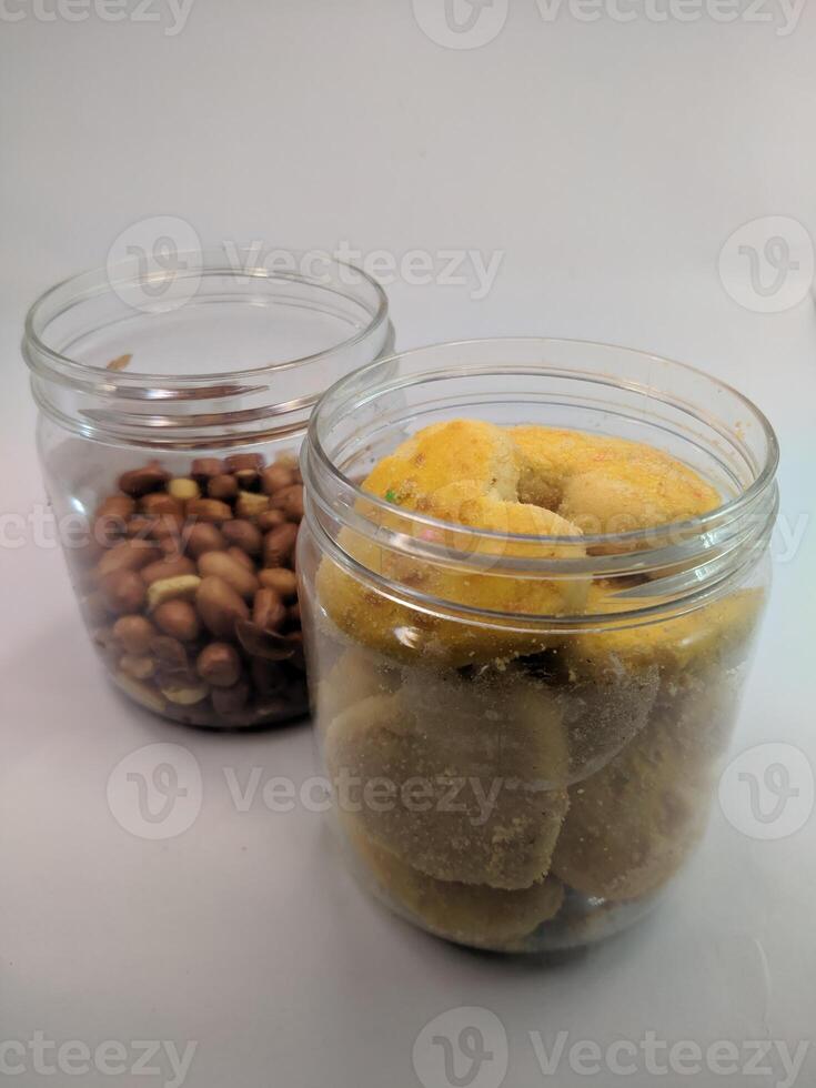 A view of the traditional cake of Ramadan or after the Eid al-Fitr holiday in Indonesia made from nuts as the main ingredient is seen in a bowl on a white background photo