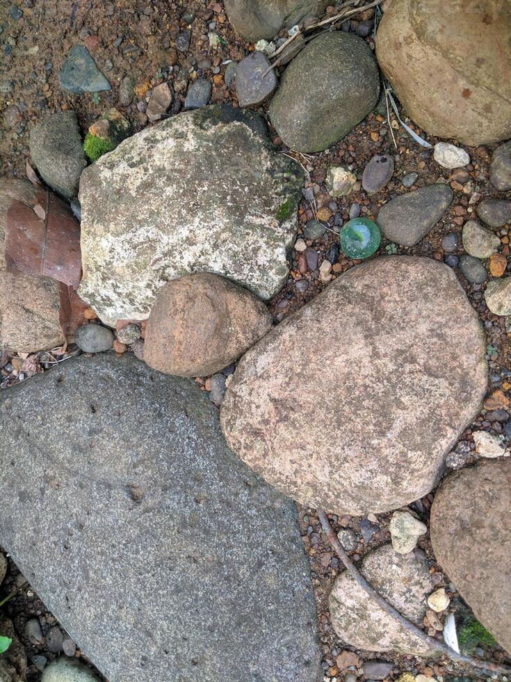 Close up view and background of strange patterns of rocks in a mountainous area taken during cross-country travel in Sulawesi, Indonesia. photo