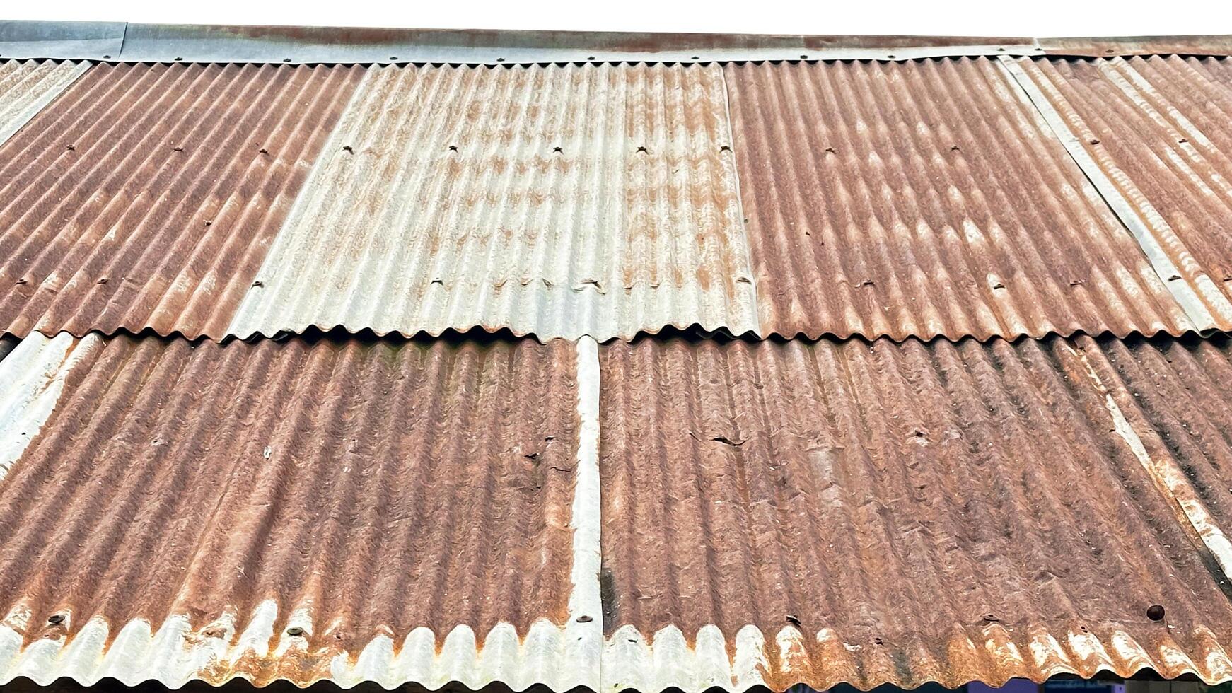 Texture of rusty galvanized metal roof sheets with some dirty photo