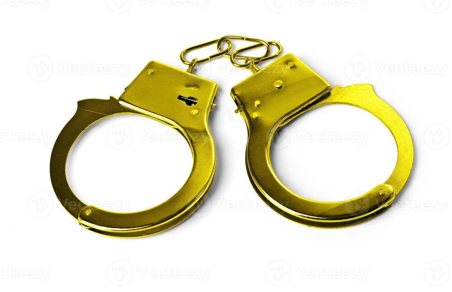Old handcuffs on white background photo