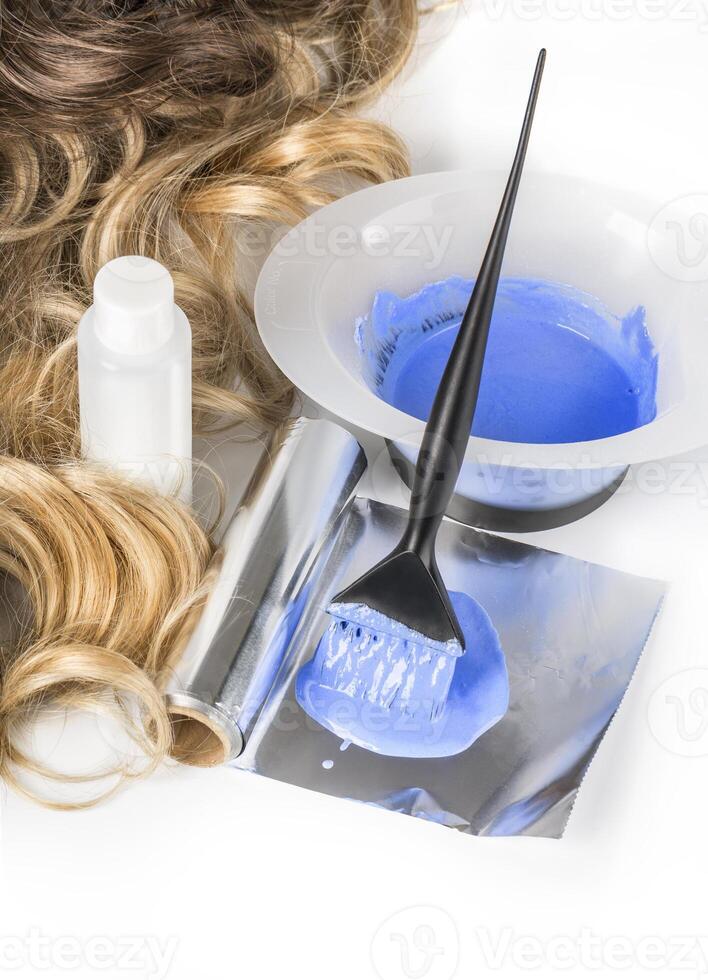 Hairdressing tools on white photo