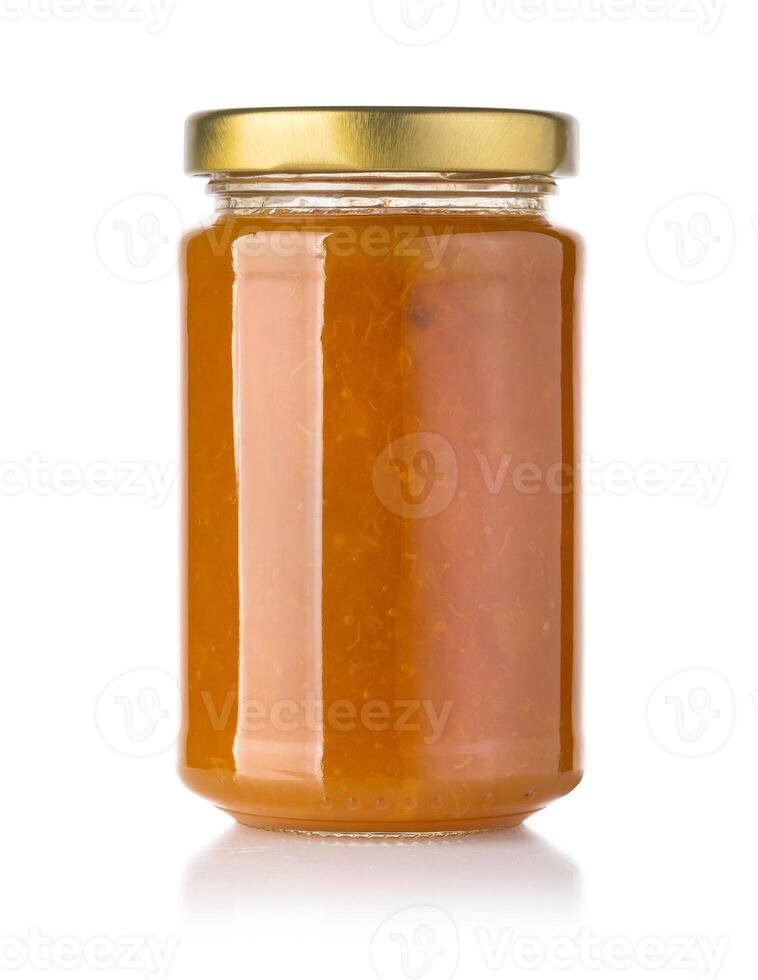 Jar of Apricot or peach jam photo