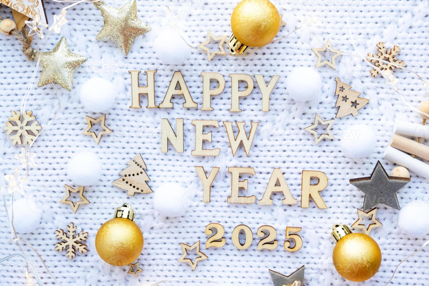 Happy New Year wooden numbers 2025 on cozy festive white knitted background with sequins, stars, lights of garlands. Greetings, postcard. Calendar, cover photo