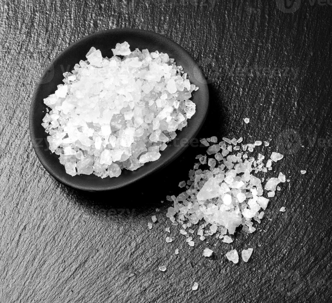 white salt on black photo