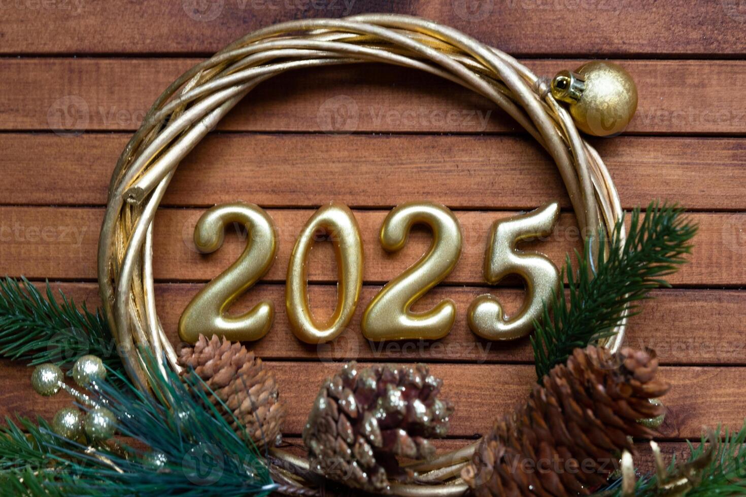Happy New Year golden numbers 2025 on cozy festive brown wooden background with sequins, snow, lights of garlands. Greetings, postcard. Calendar, cover photo