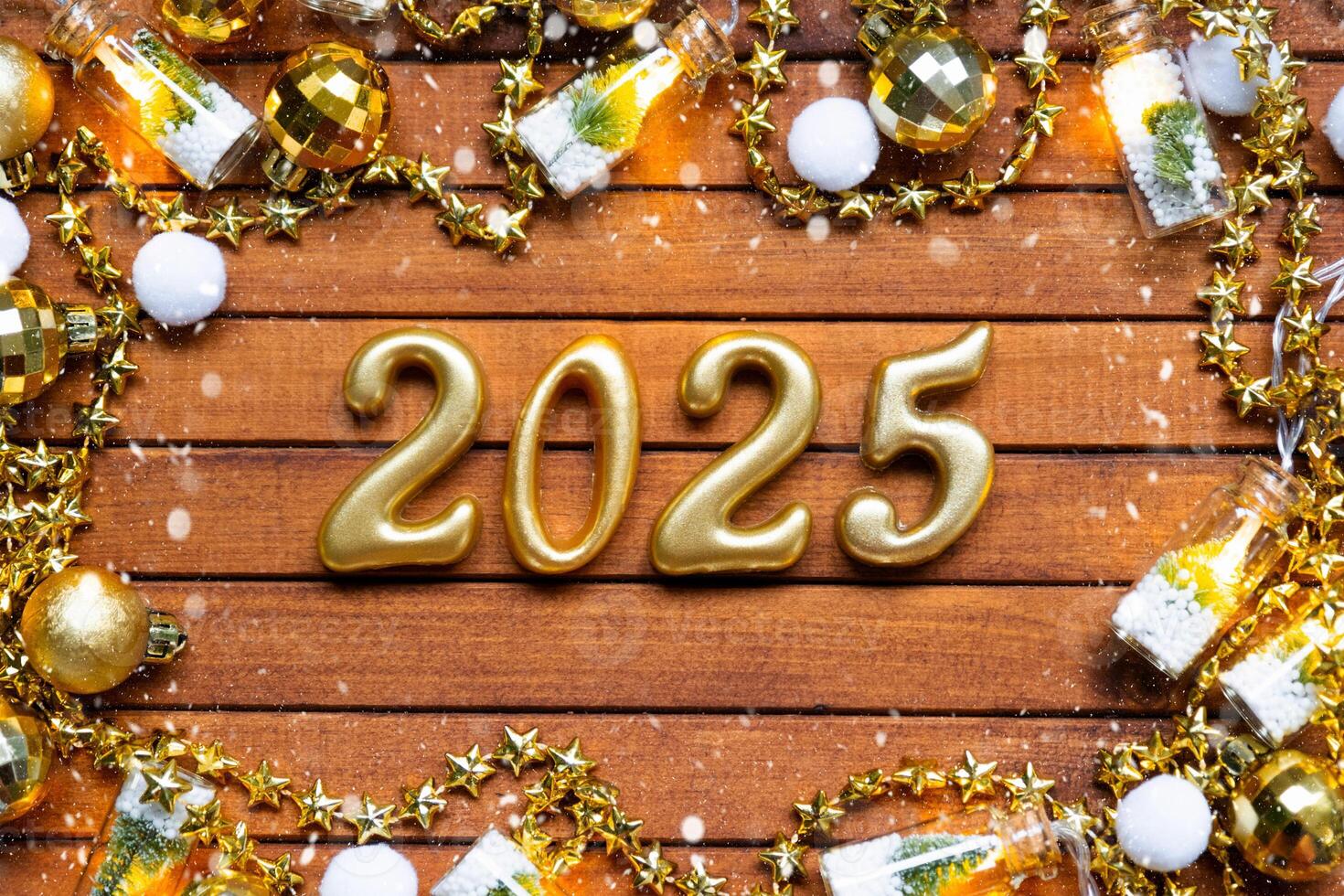 Happy New Year wooden numbers 2025 on cozy festive brown wooden background with sequins, snow, lights of garlands. Greetings, postcard. Calendar, cover photo