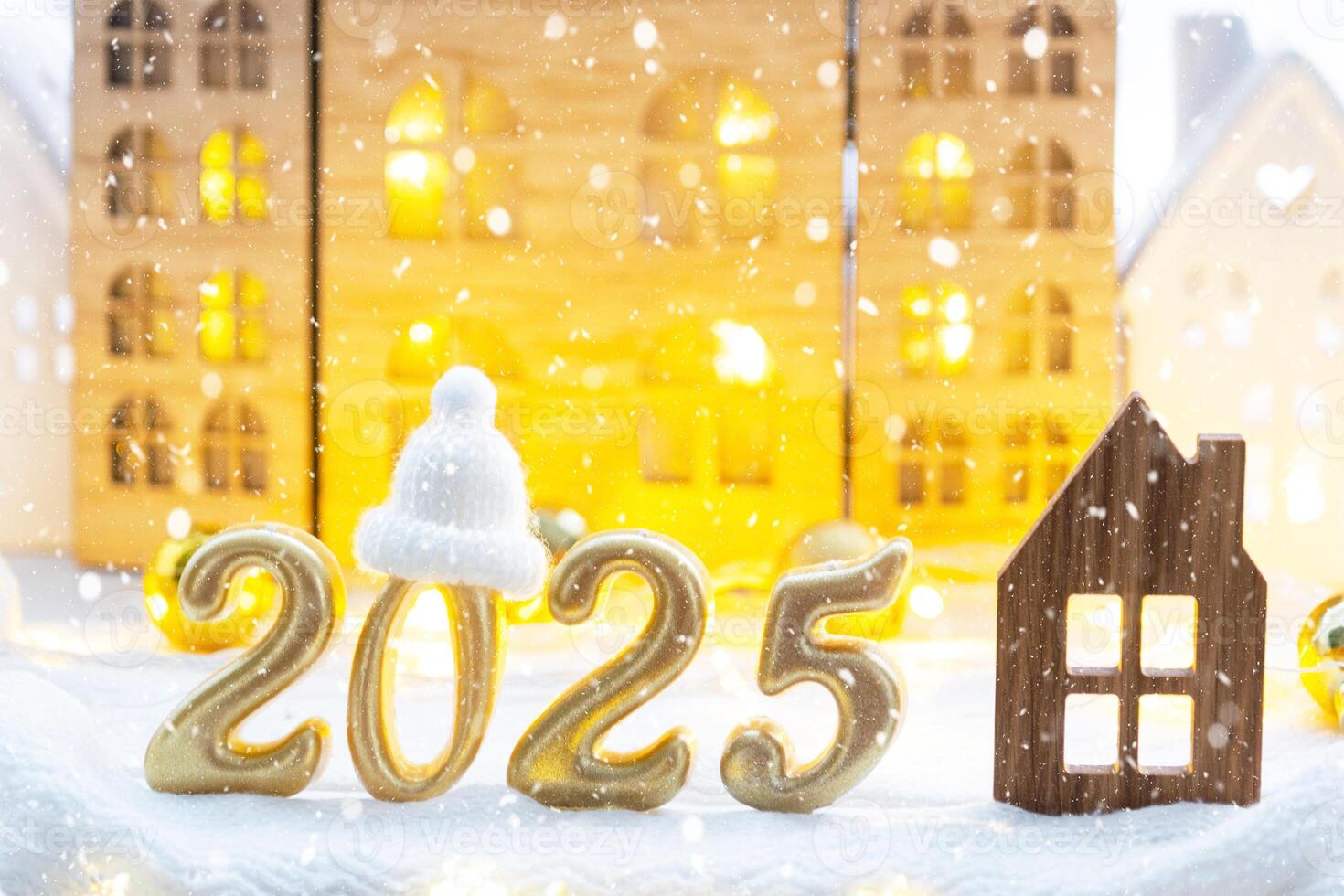 Golden figures number 2025 and tiny home on background of cozy windows of a house with warm light with festive decor of stars,snow and garlands. Greeting card, Happy New Year, cozy home photo