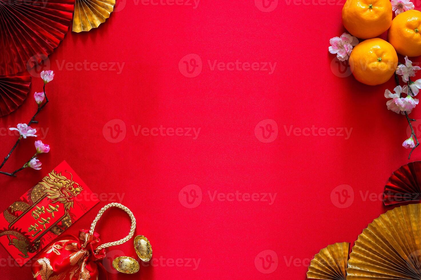 Chinese new year concept with red envelope packets or ang bao word mean auspice, red bag, ingots word mean wealth and oranges on red cloth background. photo