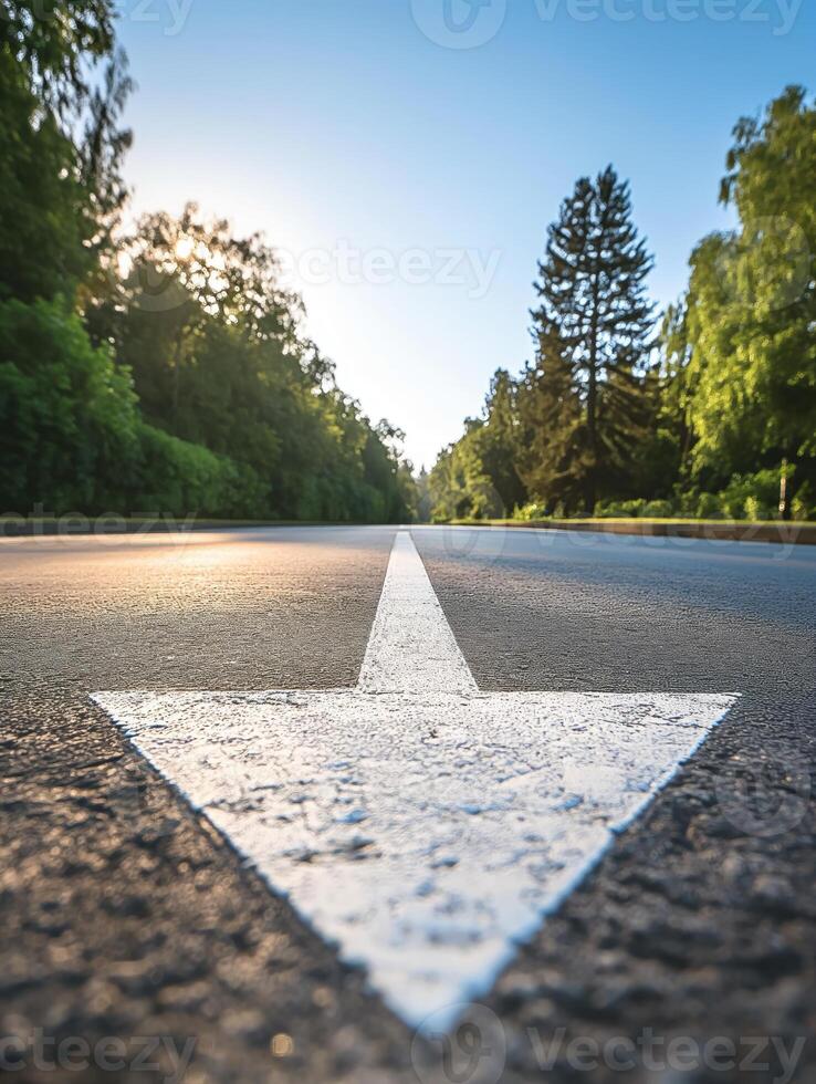 ai generado flecha en el asfalto de el la carretera atrás. objetivo y camino concepto. Copiar espacio. foto