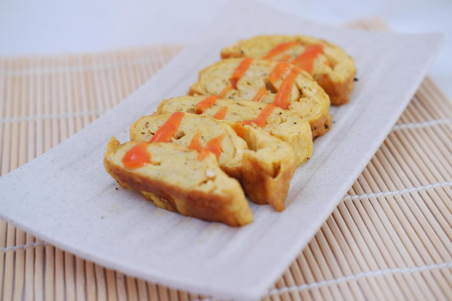 Slices of omelet on a plate photo