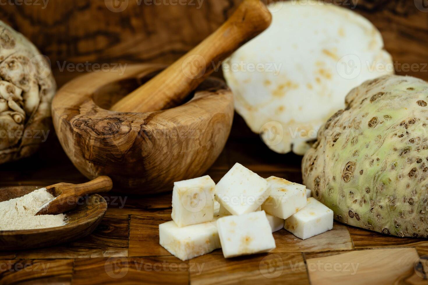 Fresh celery Apium graveolens on olive wood photo