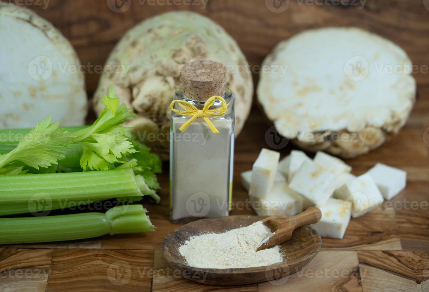 Fresh celery Apium graveolens on olive wood photo