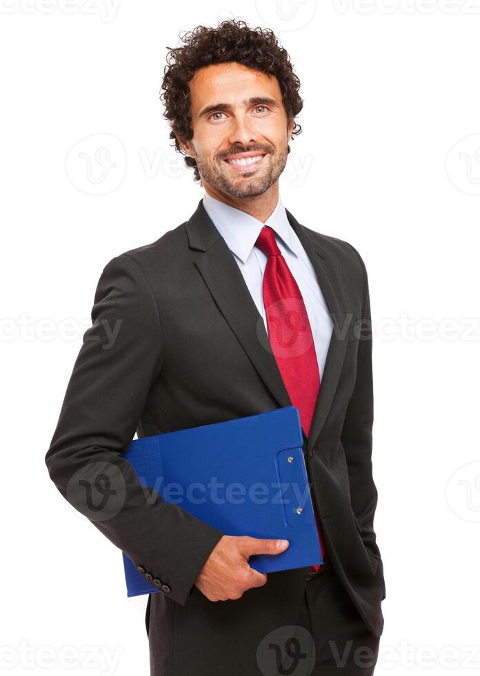 Handsome manager holding a clipboard photo