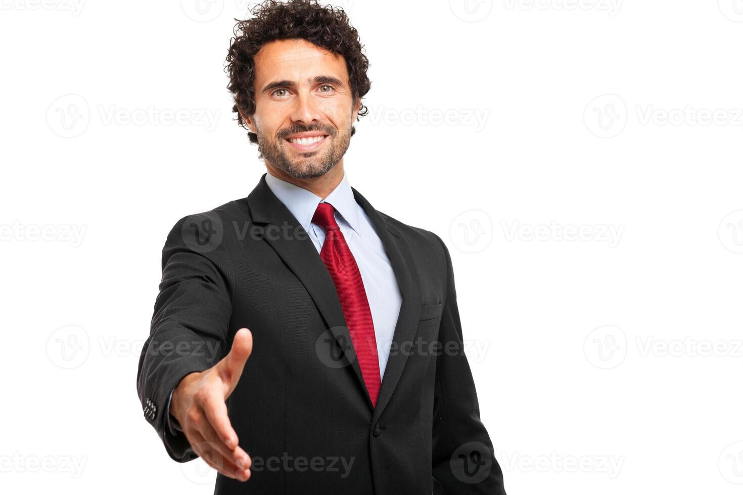 Businessman giving his hand photo