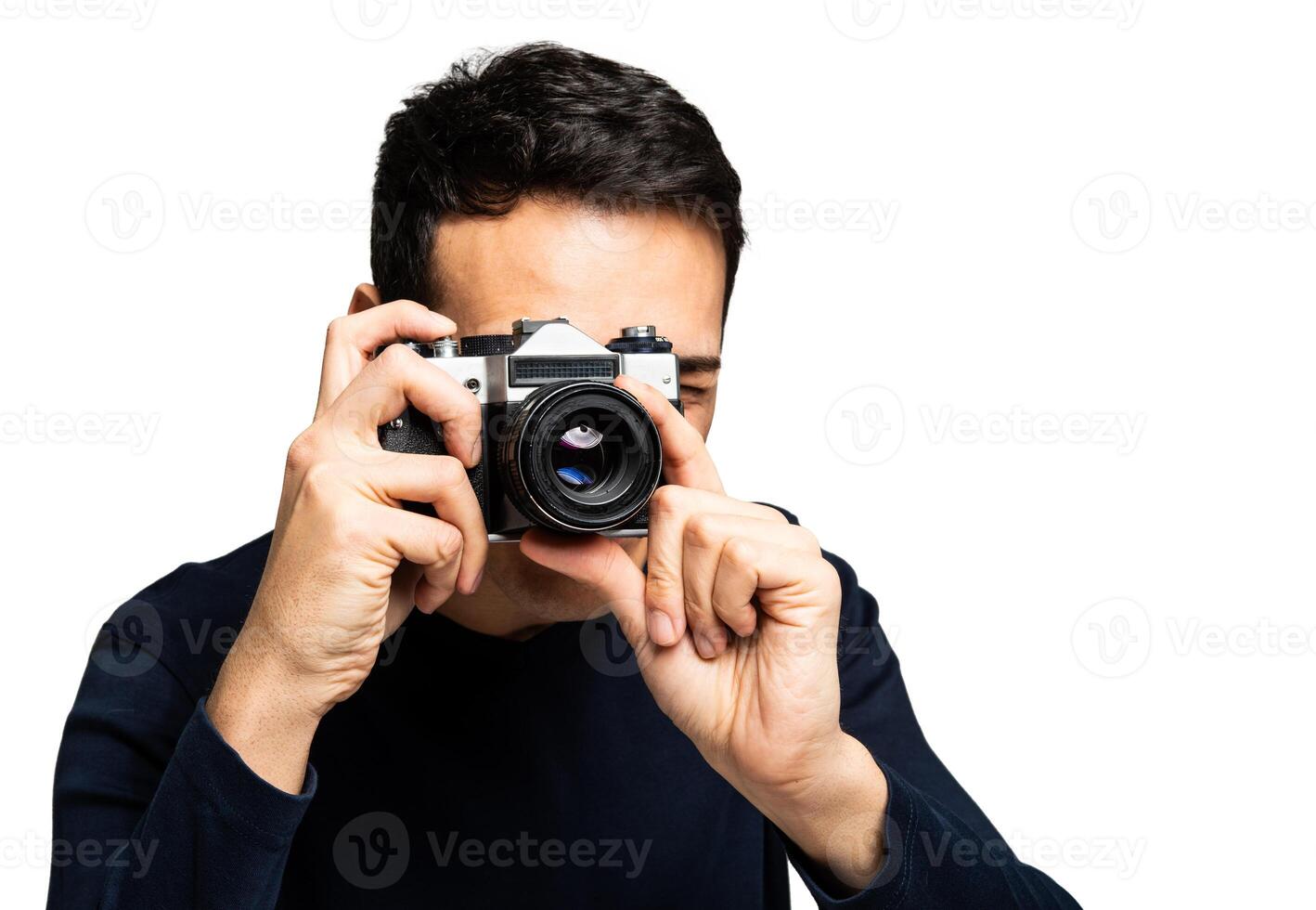 Young photographer with camera, isolated on white photo