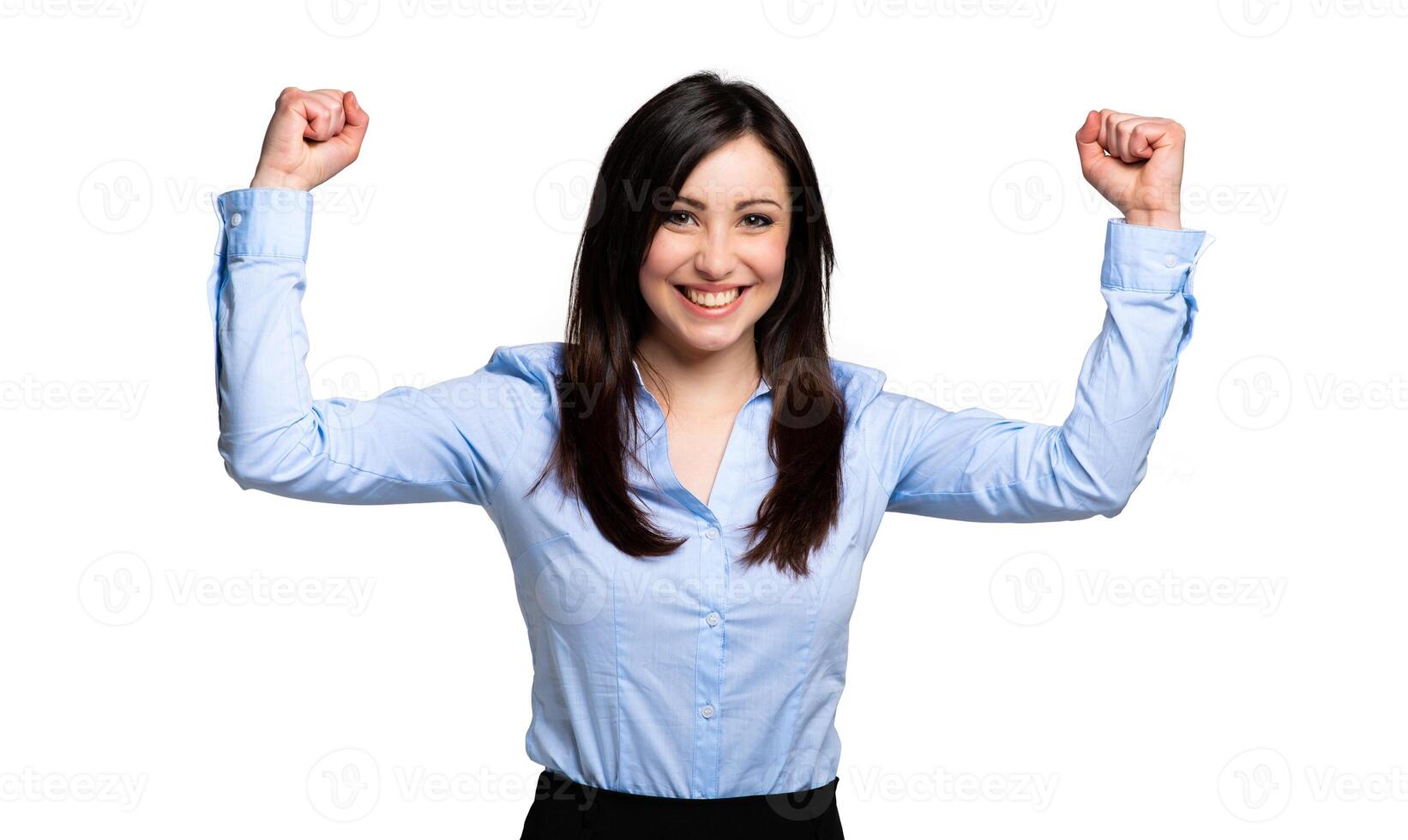 Portrait of young woman celebrating her victory isolated on white background in photo studio