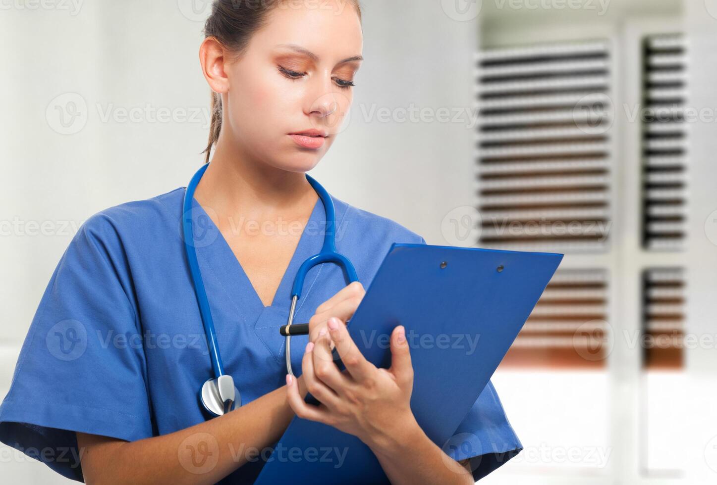 Portrait of a friendly female nurse photo