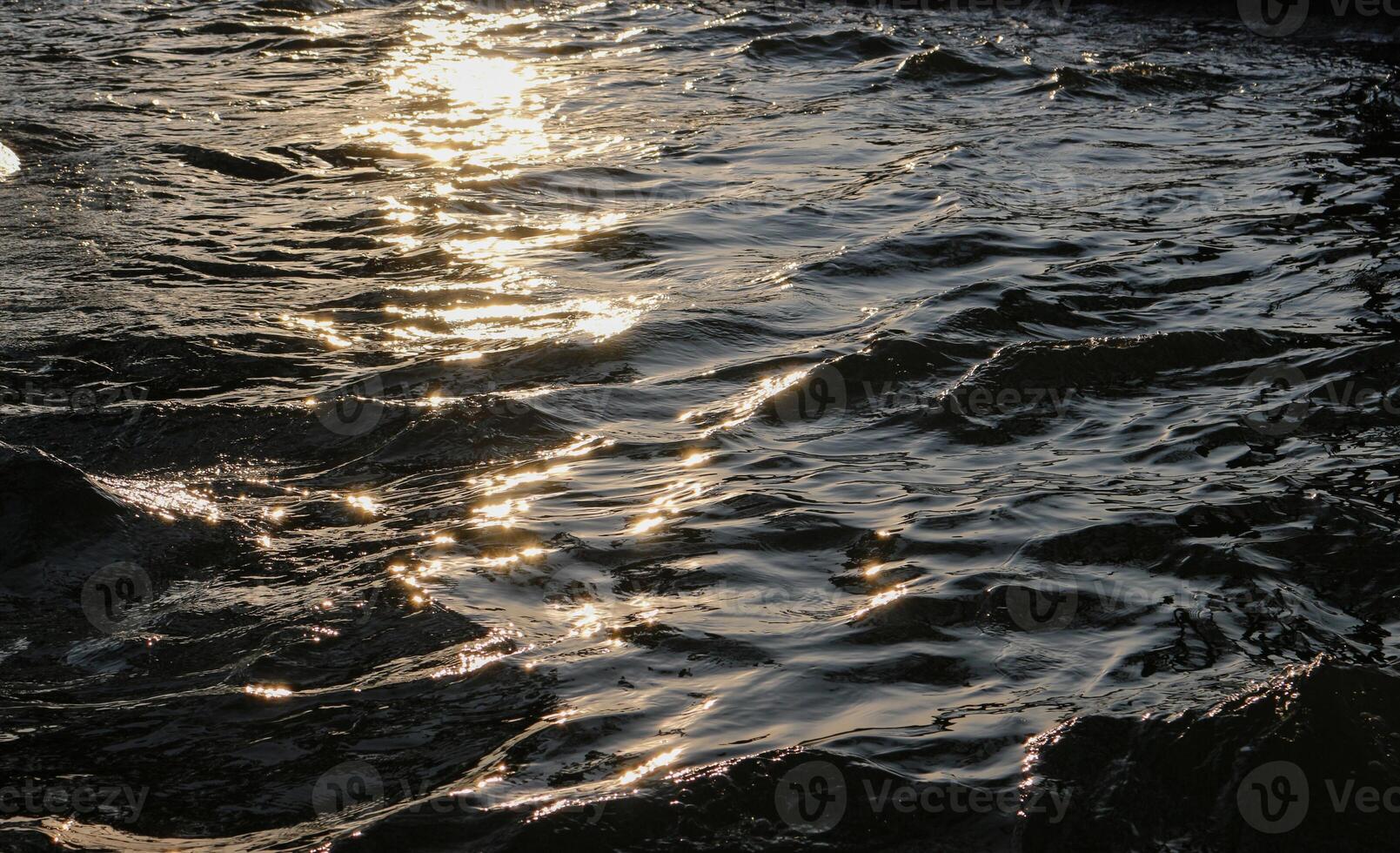 Sunlight Reflection On The Surface Of The Water photo