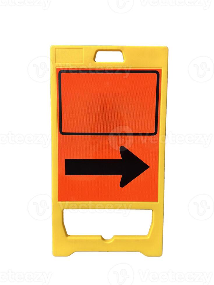 Floor-standing folding sign warning the road to follow the black arrow for safety on a white background. photo