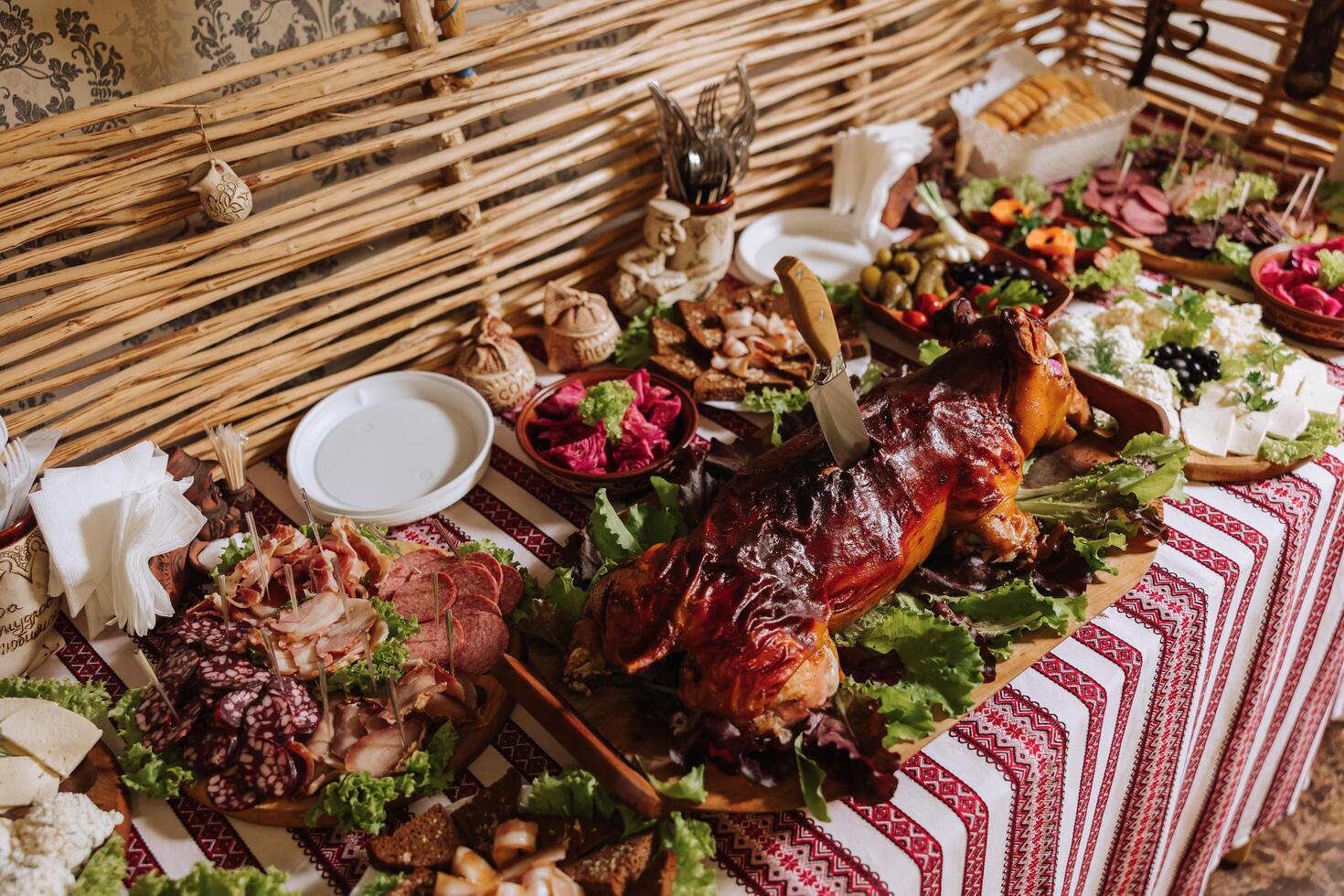Cossack table. Banquet hall Meat treats for guests. Homemade cutouts. Pork tenderloin. Delicious meat cuts. Meat plate. Delicious compositions from smoked mint. Cottage cheese. photo
