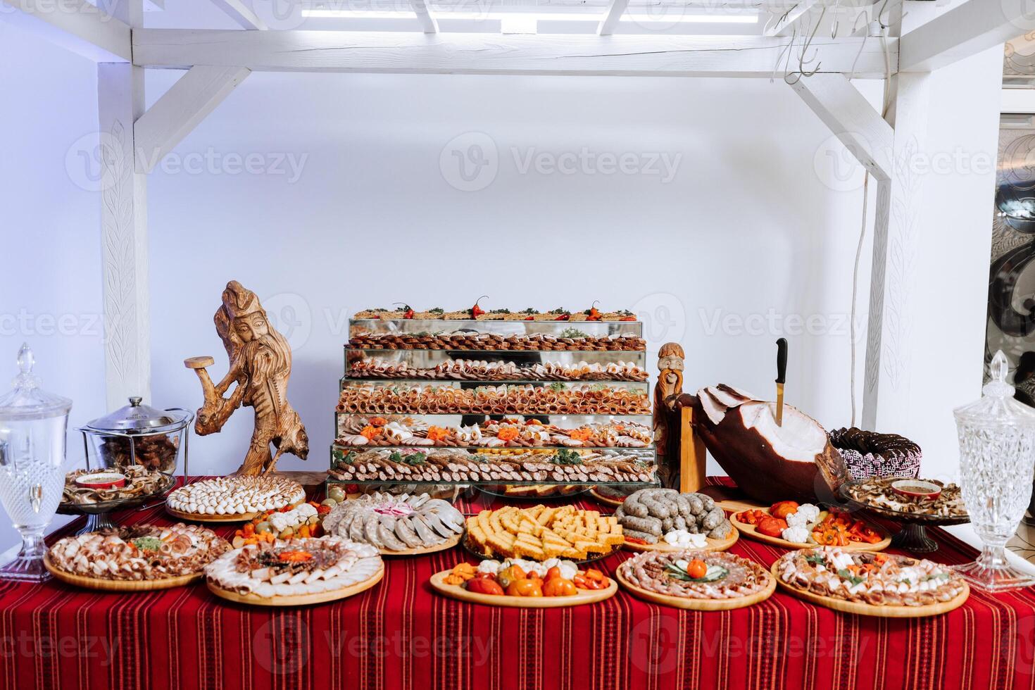 Cossack table. Banquet hall Meat treats for guests. Home-style cuts. Pork tenderloin. Delicious meat cuts. photo
