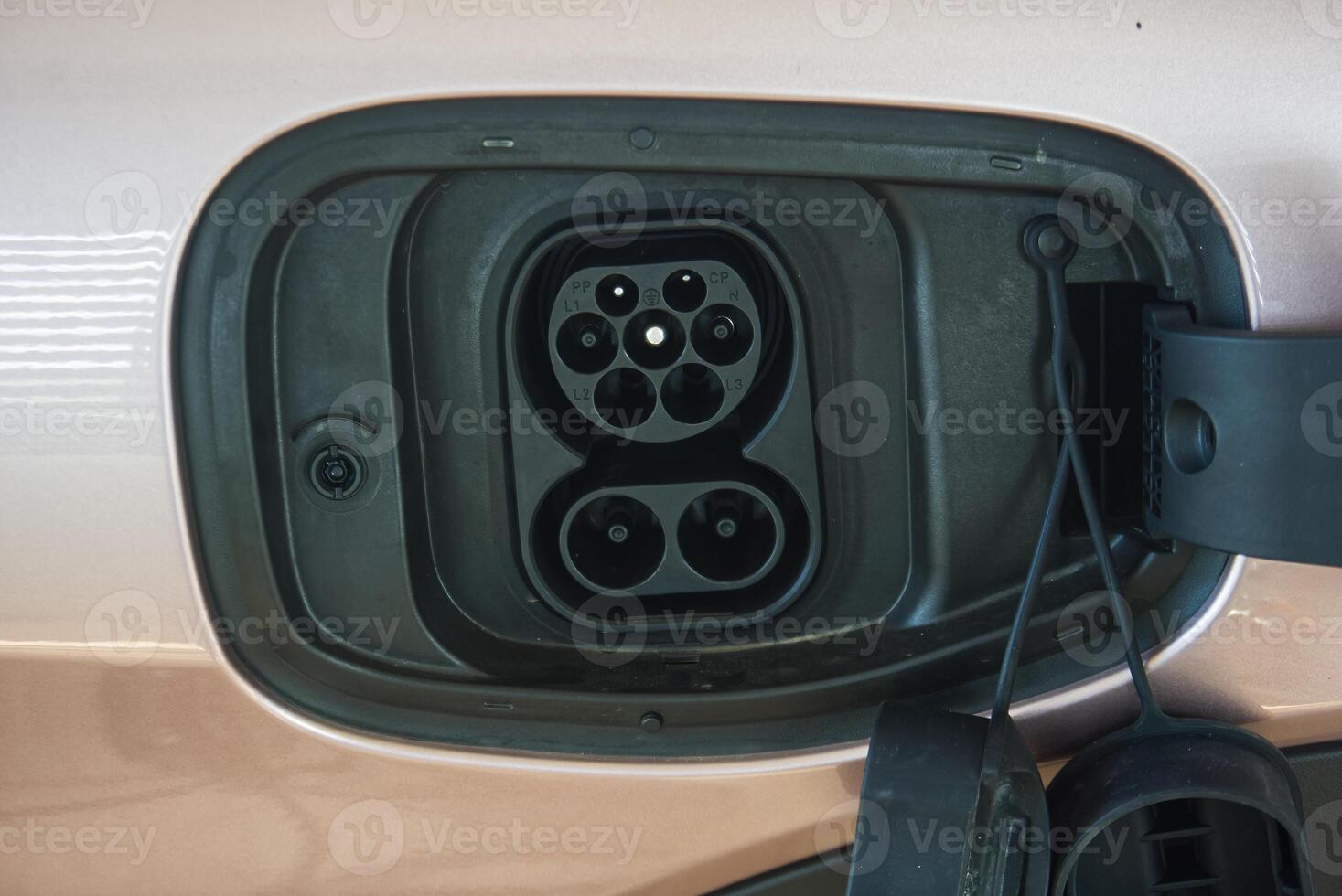 lose-up view of a type2 socket on ev car , showcasing auto technology and photography equipment. photo