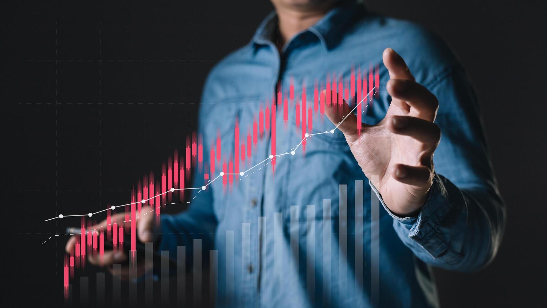 Business failure in the hands of businessmen. the graph downtrend, bear stock market, economic crisis, or recession. photo